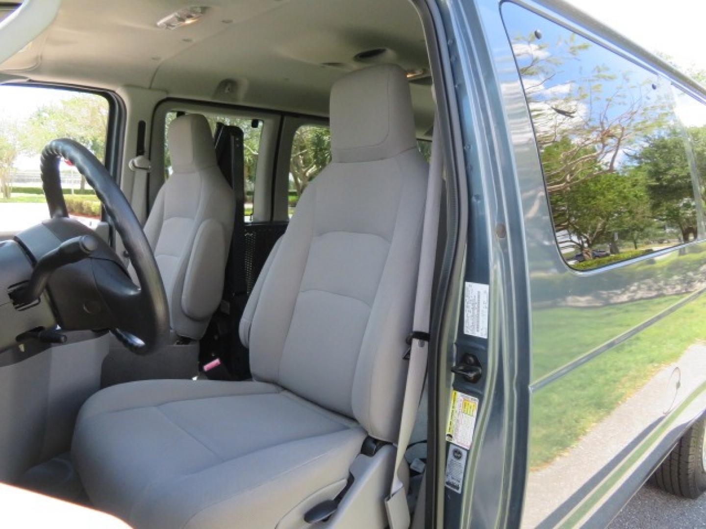 2013 Dark Blue /Gray Ford E-Series Wagon XLT (1FMNE1BW4DD) with an 4.6L V8 engine, Automatic transmission, located at 4301 Oak Circle #19, Boca Raton, FL, 33431, (954) 561-2499, 26.388861, -80.084038 - You are looking at a Gorgeous 2013 Ford E150 XLT Handicap Wheelchair Conversion Van with 22K Original Miles, Tie Down System, Power Electric VMI Side Entry Wheelchair Lift, Back Up Camera, Factory Navigation and Much Much More. This van is Awesome. This is a Nice Rust Free Van with a Clean Carfax, C - Photo#75